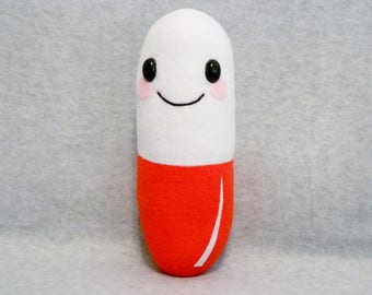 happy pill stuffed toy