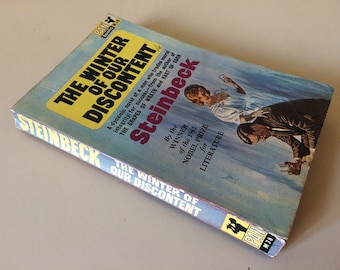 Pan vintage copy of The Winter of our Discontent by John Steinbeck