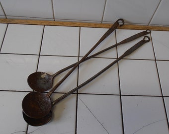 Three French vintage metal spoons