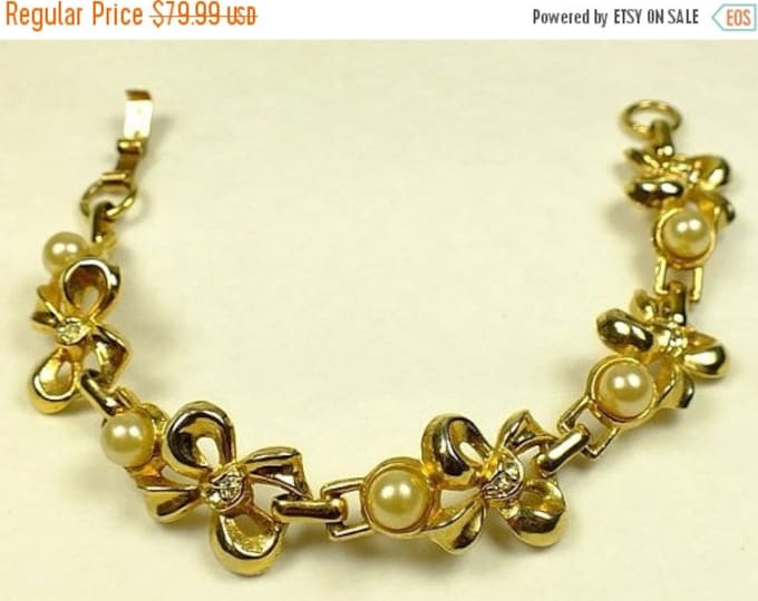 Storewide 25% Off SALE Vintage gold-tone Bow link charm styled bracelet accented with clear crystal stones and lovely cultured pearls