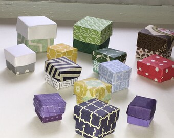 Handmade 2 piece small jewelry boxes for earrings, rings or other small items. Various colors and sizes from 3/4 inch to 2 inches..