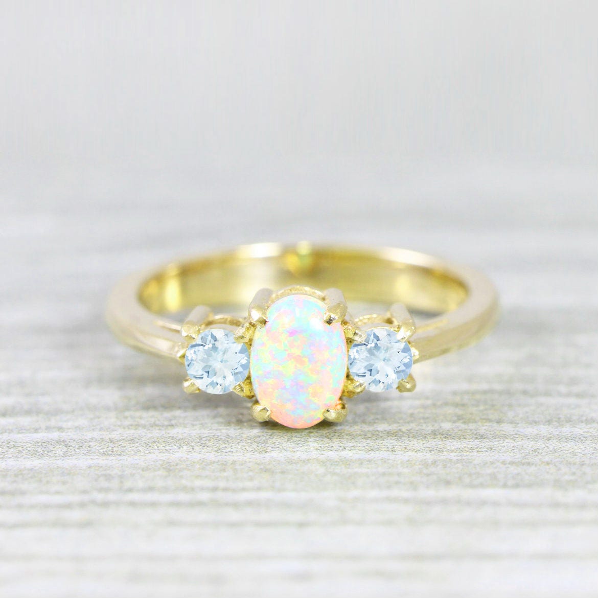 Opal and aquamarine engagement ring handmade trilogy three