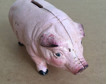 Old piggy bank cast iron (pig)