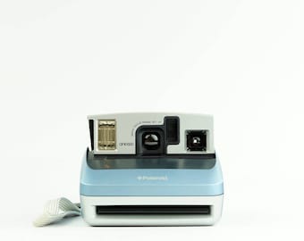 POLAROID One600 Classic Blue Instant Film Camera - *Discount Impossible Project 600 Colour Instant film Pack offer with this Camera*