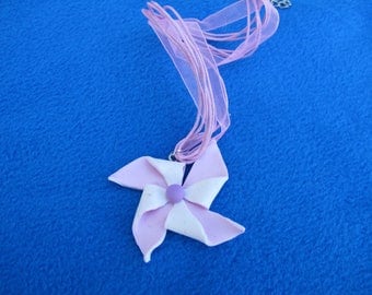 Pink and white pinwheel pendant necklace