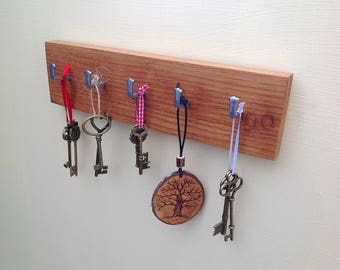 Stylish Hooks live edge oak wall key rack. 3 hooks. solid oak wood. stylish Stylish Hooks live edge oak wall key rack. 3 hooks. solid oak wood. stylish