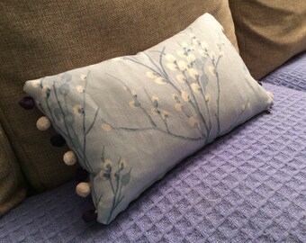 Cushion Laura Ashley heligan in eau de nil with Susie Watson green and ivory pompom braid