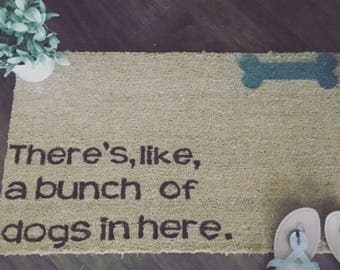 Theres, like, a bunch of dogs here door mat