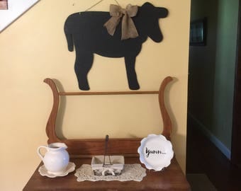 Wooden Cow painted with black board paint