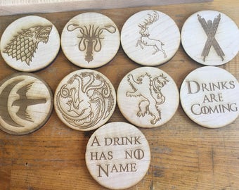 Houses of Game of Thrones coasters set of nine. Bolton, barateon,greyjoy,lannister,stark,arryn, targaryaen. Hardwood maple and red felt bac