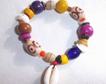 Glass beads and polymer clay with cowry bracelet