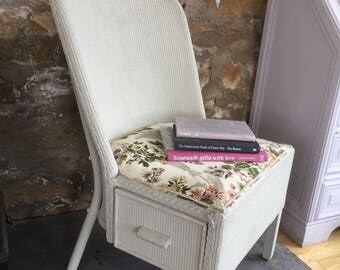 Vintage Lloyd Loom nursing chair with side drawer