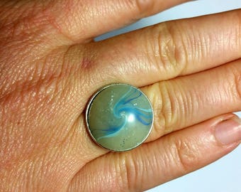 Transparent, blue swirl and silver glitter ring
