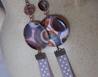 These earrings pop dots and circles