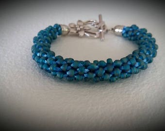 Iridescent matte blue beaded bracelet