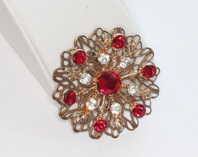 Red and Clear Rhinestone Filigree Brooch Gold Tone Atomic Style Vintage