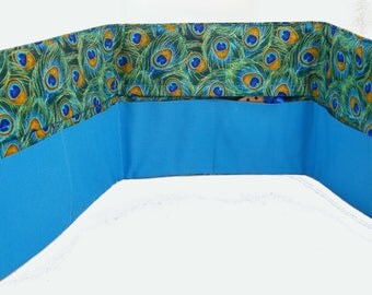 Circular knitting needle case. Peacock fabric.