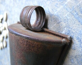 a small vintage French scoop, seed scoop, metal scoop, rust,patina