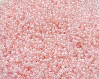 5 OZ OF 1.5 MM ROUND PALE PINK BEADS IN BULK