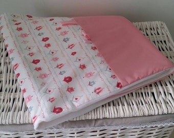 Baby Pink and white plaid blanket very soft.