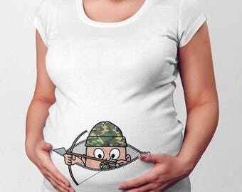 baby peeking out of belly shirt