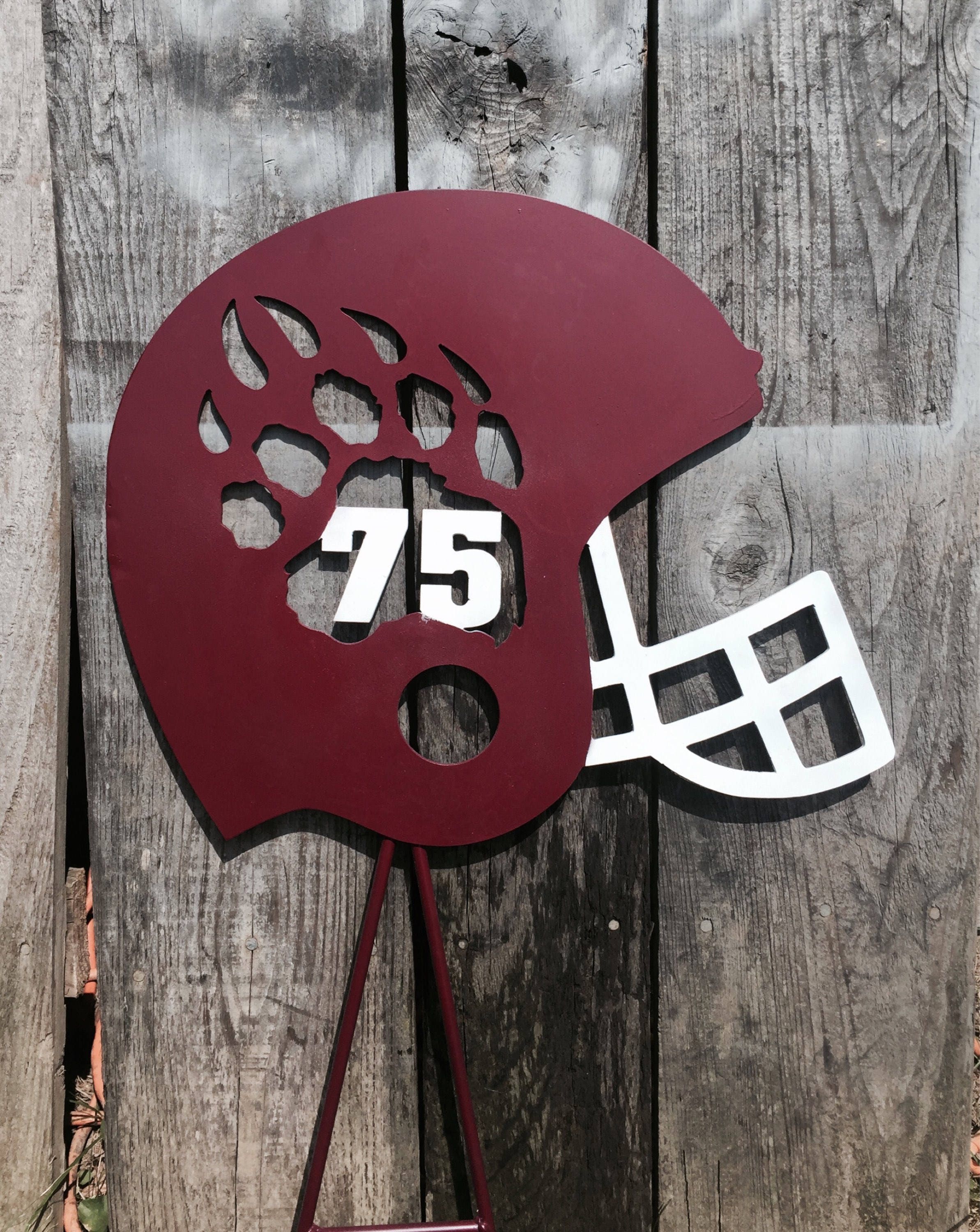 Custom metal football or high school mascot yard signs.