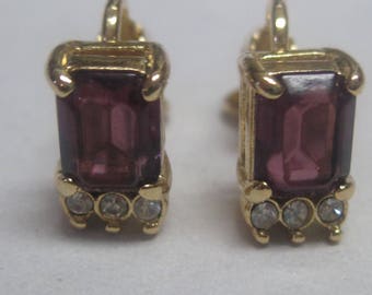 Costume Gold Toned Clip on earring with Purple Stone and Diamond like stones.
