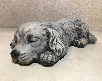 sleeping puppy statue