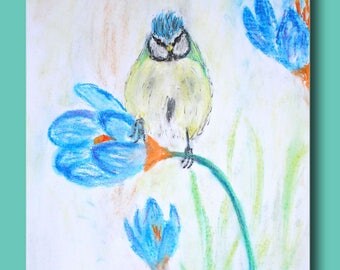 Little blue tit perched on a flower