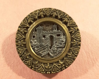 Early 1900's picture button of a castle.