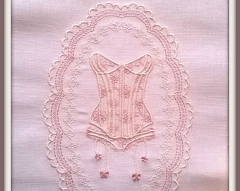Medallion with embroidered corset