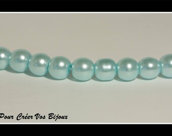 Set of 25 8mm clear turquoise glass beads