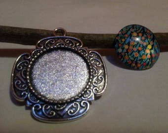 Antique silver embossed ring around
