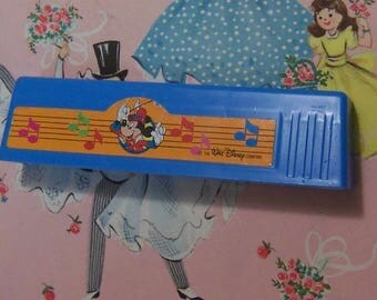 toy plastic walt disney harmonica