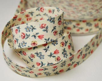 Sewing bias folded 2cm blue background and coral flower pattern cotton cream (by the yard) ref: BIAI03