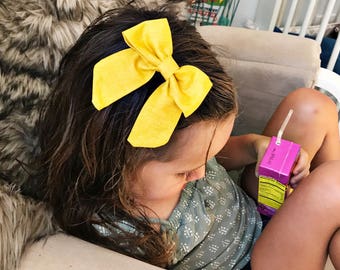SALE- Textured Mustard : retro bow on clip