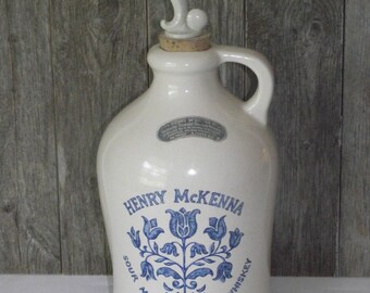 Henry McKenna Bourbon stoneware half gallon jug with original cork stopper/pourer from 1975 "sour mash" vintage whiskey.