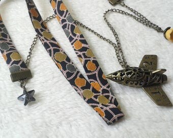 Liberty Travel airplane Tan & green necklace