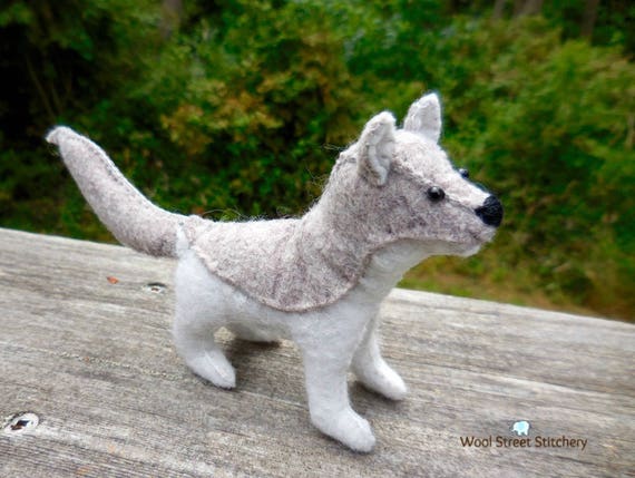 small stuffed wolf