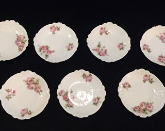 Seven Antique Haviland Limoges Butter Pats