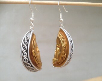 Earrings made of recycled Nespresso capsules