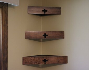 Set of three decorator wood corner wall shelves with cross