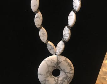 White and gray necklace and earrings