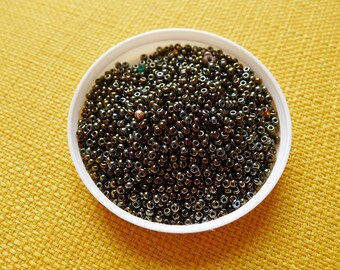 5 gr in 1-2mm teal glass seed beads