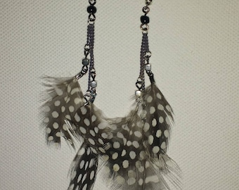 Black and white natural feather earrings