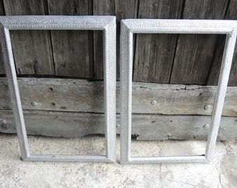 2 old stucco on wood frames