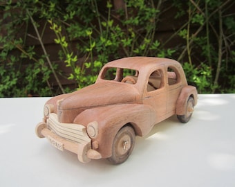 Wooden miniature of a Peugeot 203 Iroko 1/24 scale.