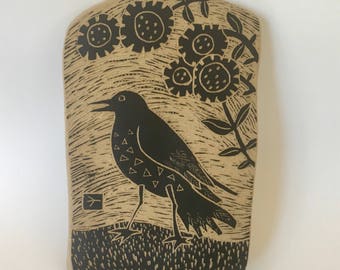 crow on a summer day hand carved ceramic art tile