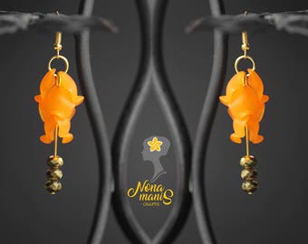 A Pair of Orange Petal Flower Earrings.