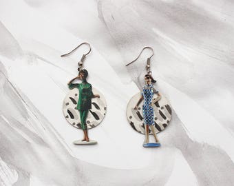 Novelty Plastock Women on Inky Background Drop Earrings